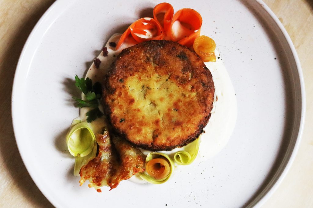 Burger di broccolo con fonduta di formaggio